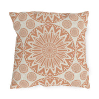 Boho Mandala outdoor pillow in terracotta and cream with a large mandala medallion, front view