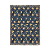 Celestial Boho woven blanket in navy with gold suns, moons and stars, shown flat