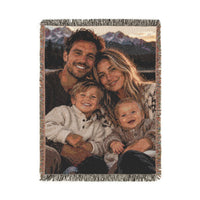 Custom photo woven blanket with a family portrait of a couple and two children woven in, front view