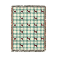 Sage gingham deer woven blanket featuring a maroon stag on a sage and cream check pattern with snowflakes