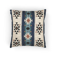Southwestern woven pillow in navy and teal with Aztec diamond motifs, front view