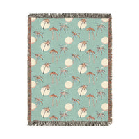 Summer palm woven blanket with tropical palm leaves, shown flat