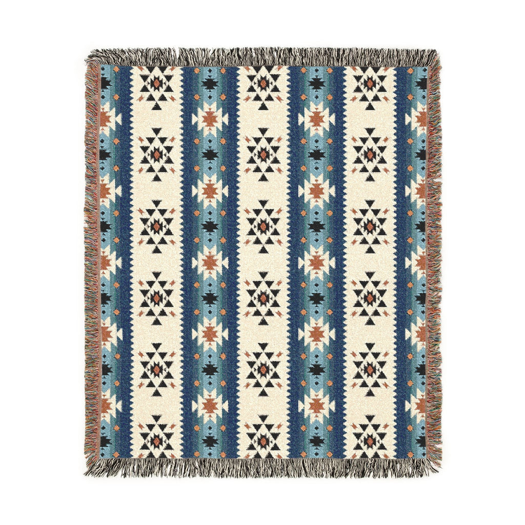 Patterned blanket with blue, beige, and brown colors on a white background
