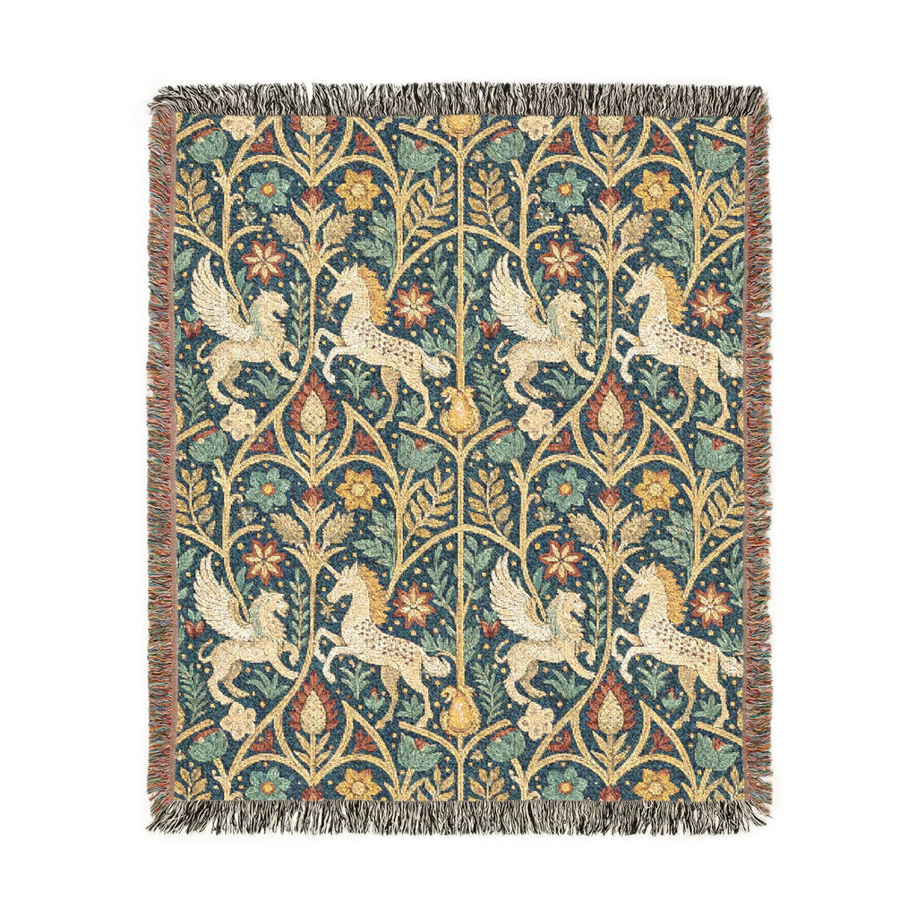 A square woven textile with fringe on all sides, featuring a repeating pattern of cream-colored foxes, flowers, and foliage on a dark teal-blue background. The design has a vintage, tapestry-like appearance.