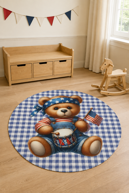Americana teddy bear round rug beside a window with bunting and a toy chest