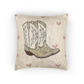Baby woven pillow with cowgirl boots and soft pink hearts on cream, front view