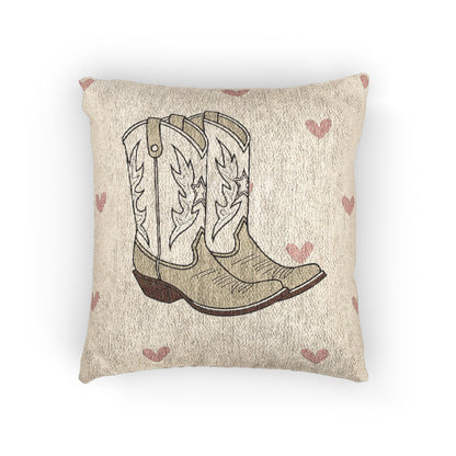 Baby woven pillow with cowgirl boots and soft pink hearts on cream, front view