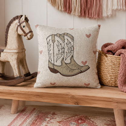 Baby woven pillow with cowgirl boots and soft pink hearts on cream