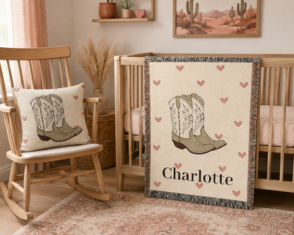 Cowgirl baby woven pillow styled with the matching cowgirl nursery items