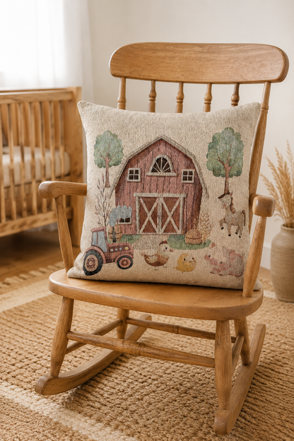 Farm nursery woven pillow with a red barn, tractor, horse, hen, chick and piglet on cream