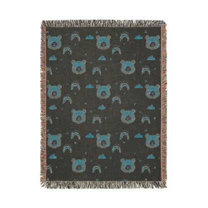 Reverse side of the bear and rainbow woven baby blanket in dark grey-teal