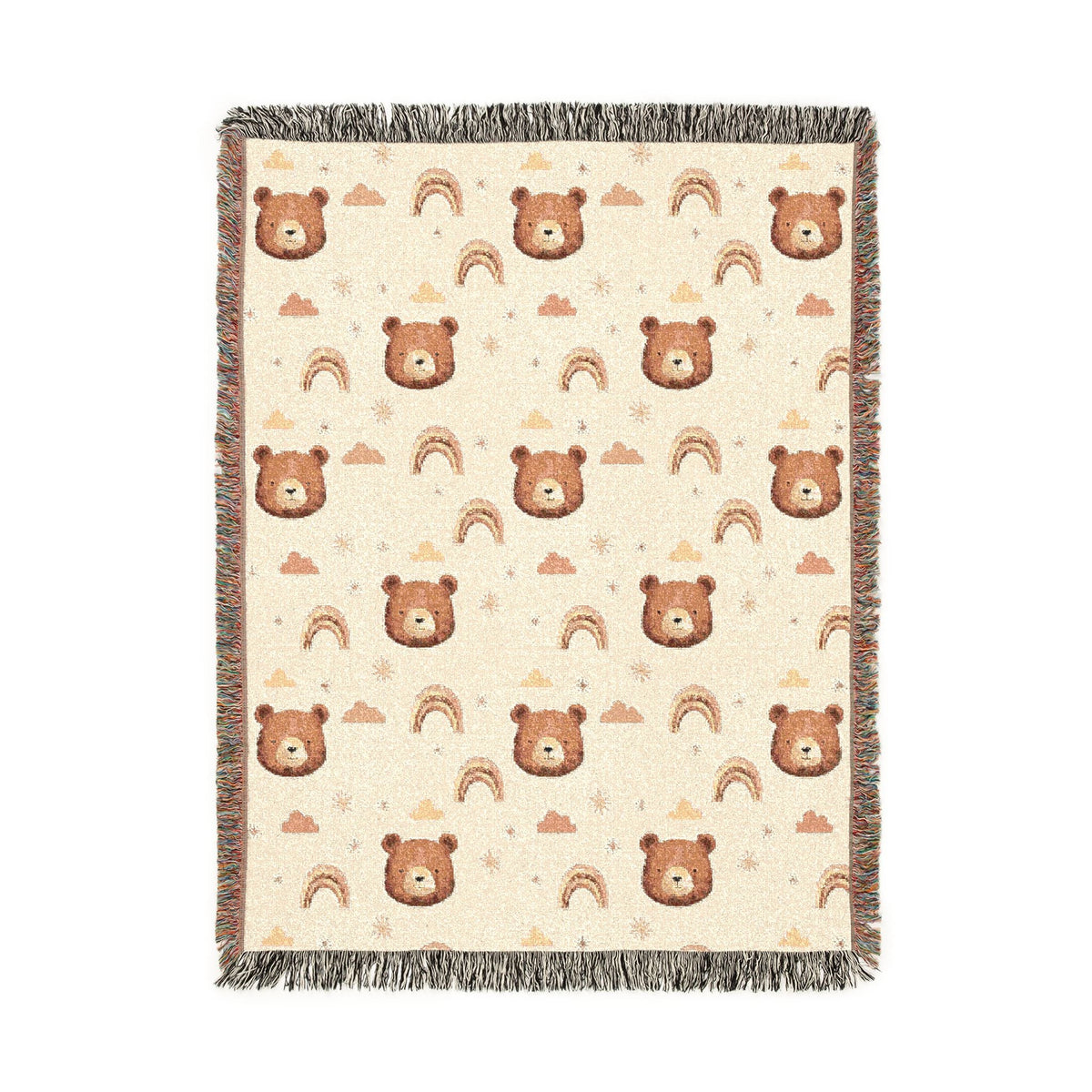 Cream woven baby blanket with brown bear faces, rainbows, clouds and stars, shown flat