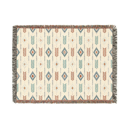 Boho Arrow woven blanket with terracotta and teal feathers, fine black arrows and diamond medallions on cream, shown flat