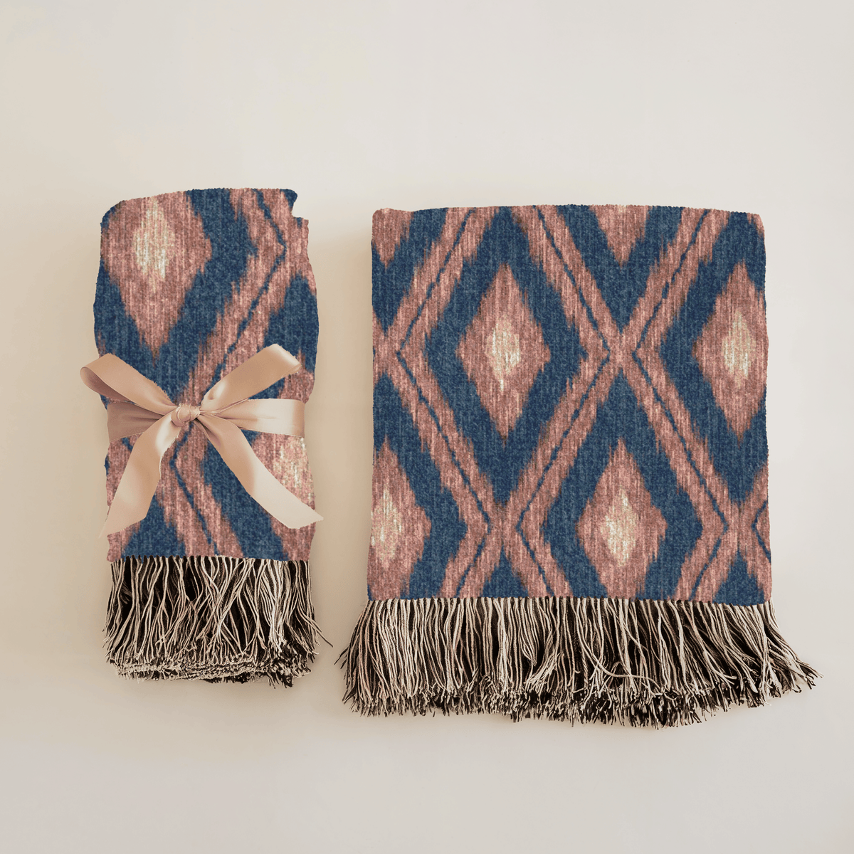 Reverse side of the navy Boho Aztec woven blanket in muted grey-green