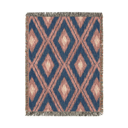 Boho Aztec woven blanket in navy and cream with rust Aztec motifs, shown flat