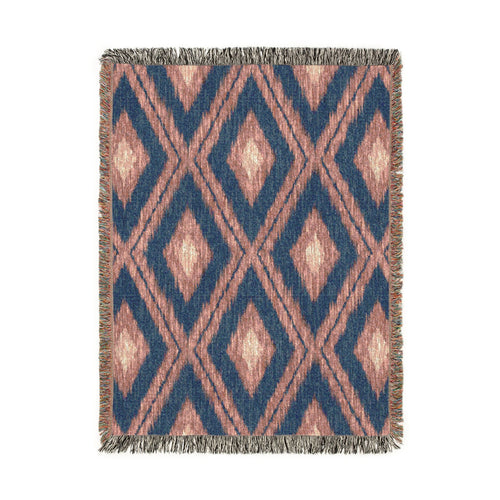 Boho Aztec woven blanket in navy and cream with rust Aztec motifs, shown flat