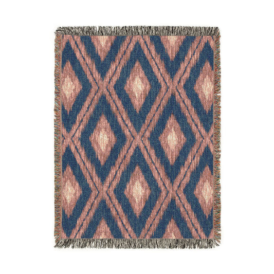 Boho Aztec woven blanket in navy and cream with rust Aztec motifs, shown flat