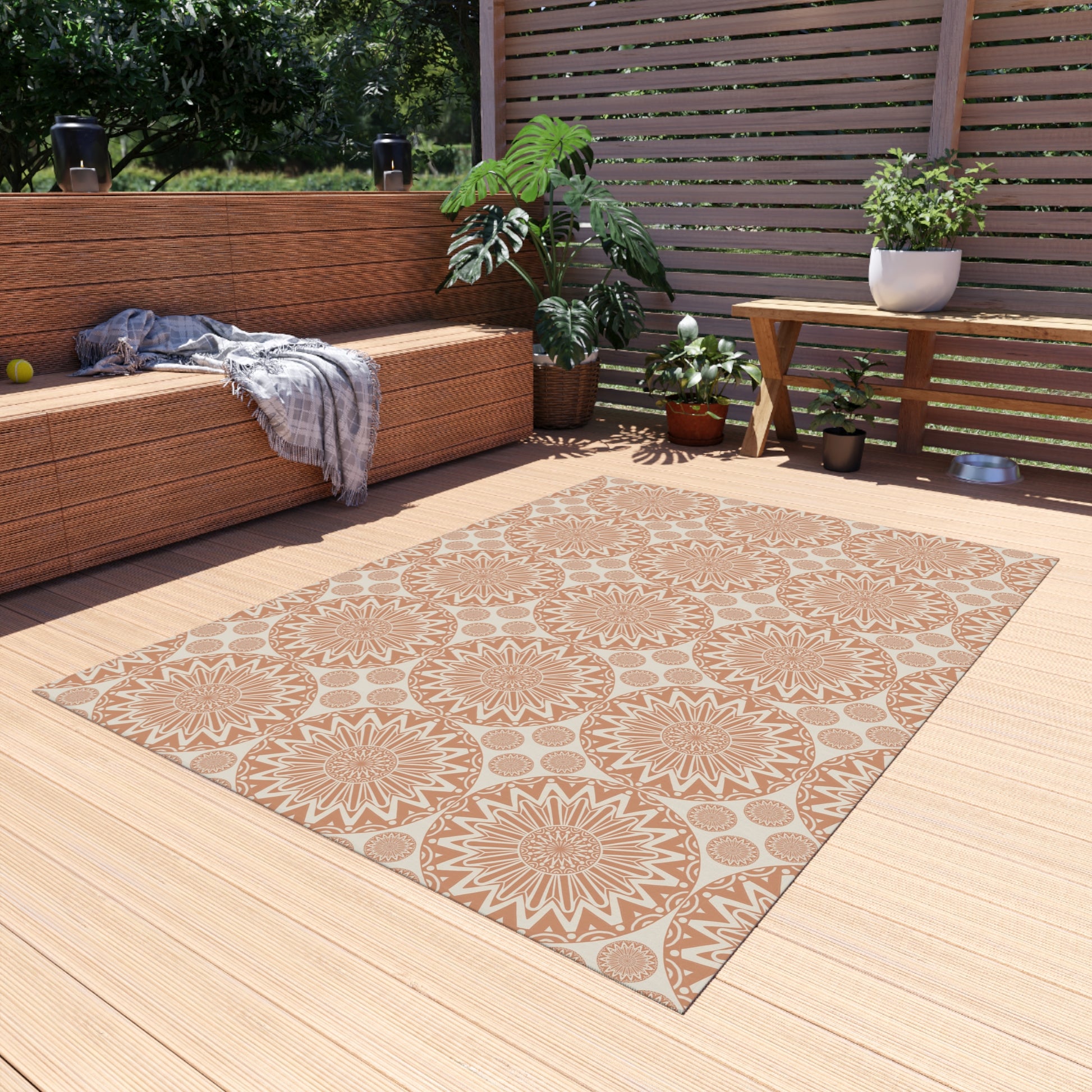 Boho Mandala outdoor rug on a wooden deck beside a built-in bench