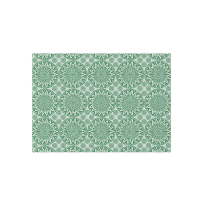 Boho Mandala outdoor rug in sage green and cream with a repeating mandala pattern, shown flat