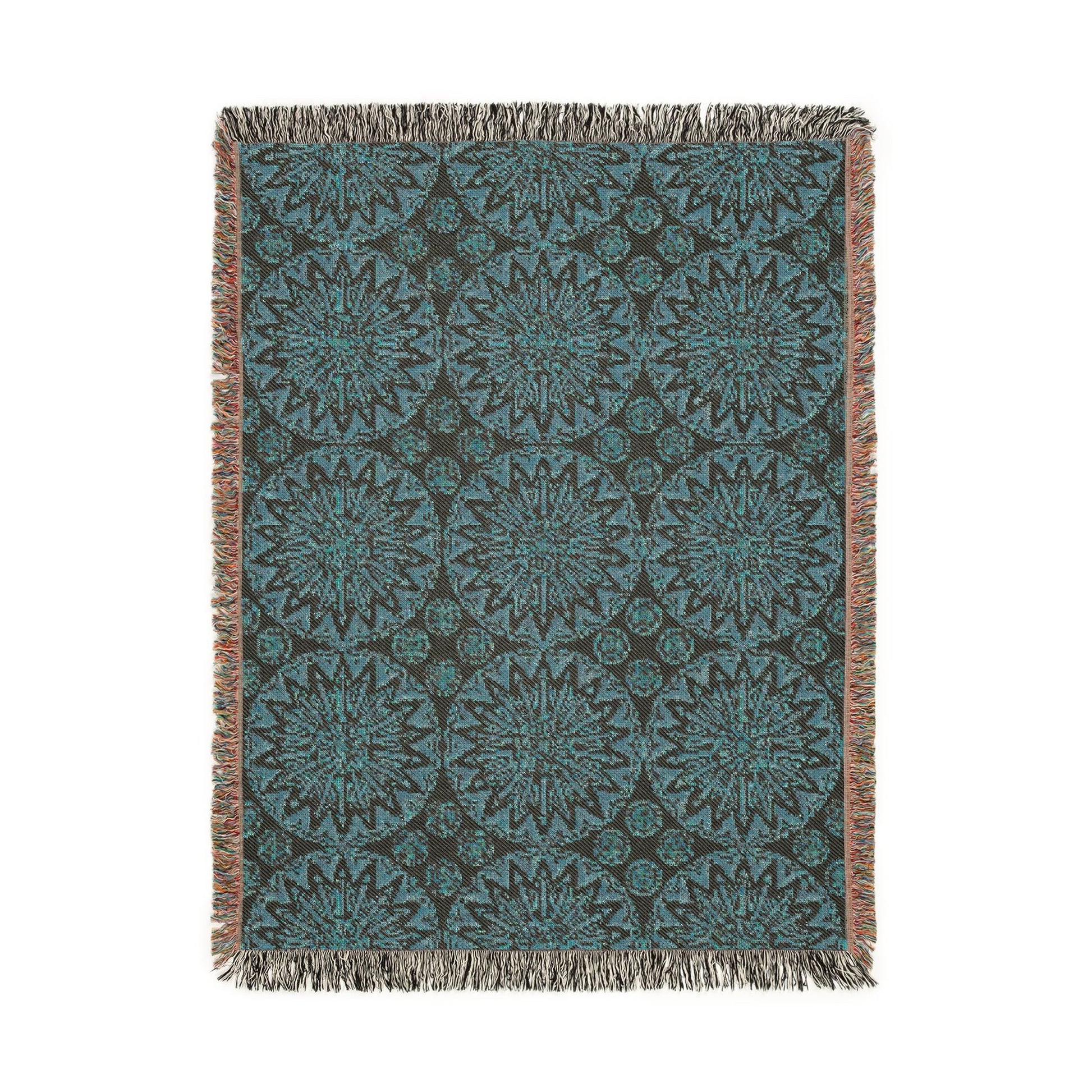 Reverse side of the Boho Mandala woven blanket in deep teal and cream