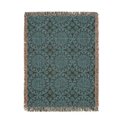 Reverse side of the Boho Mandala woven blanket in deep teal and cream