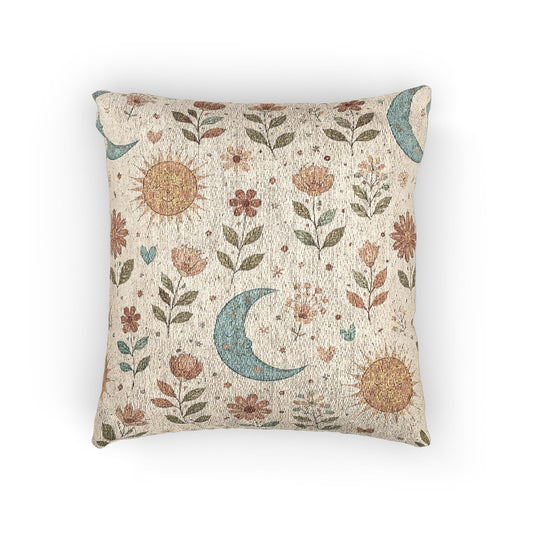 Boho woven pillow with rust suns, blue crescent moons and small florals on cream, front view