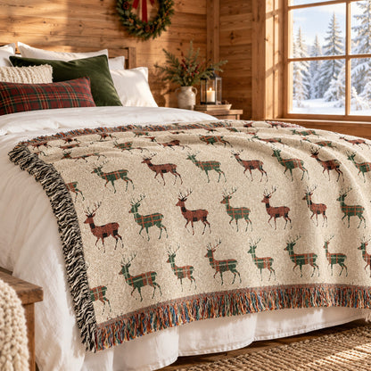 Buffalo Plaid Deer woven blanket at the foot of a bed in a festive cabin bedroom