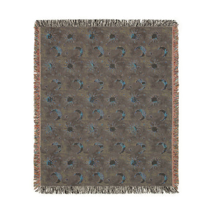 Reverse side of the Celestial Boho woven blanket in muted grey-green