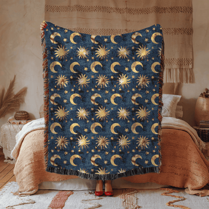 Person holding up the Celestial Boho woven blanket, showing its size