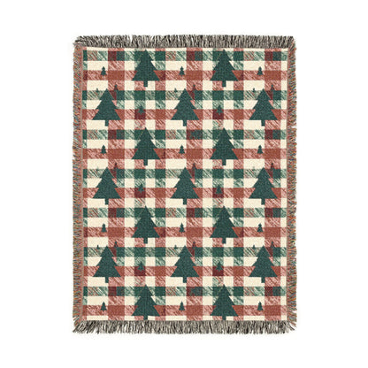 Christmas tree plaid woven blanket featuring dark green tree motifs on a rust and cream buffalo-check pattern