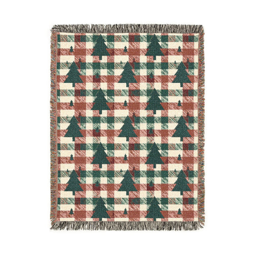 Christmas tree plaid woven blanket featuring dark green tree motifs on a rust and cream buffalo-check pattern