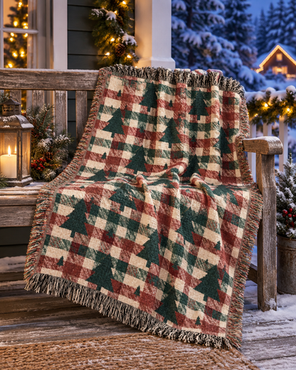 Christmas tree plaid woven blanket styled in a cozy living room by a window with festive lights