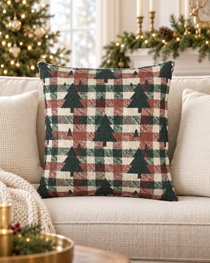 Christmas tree plaid woven pillow styled on a cream couch near a Christmas tree