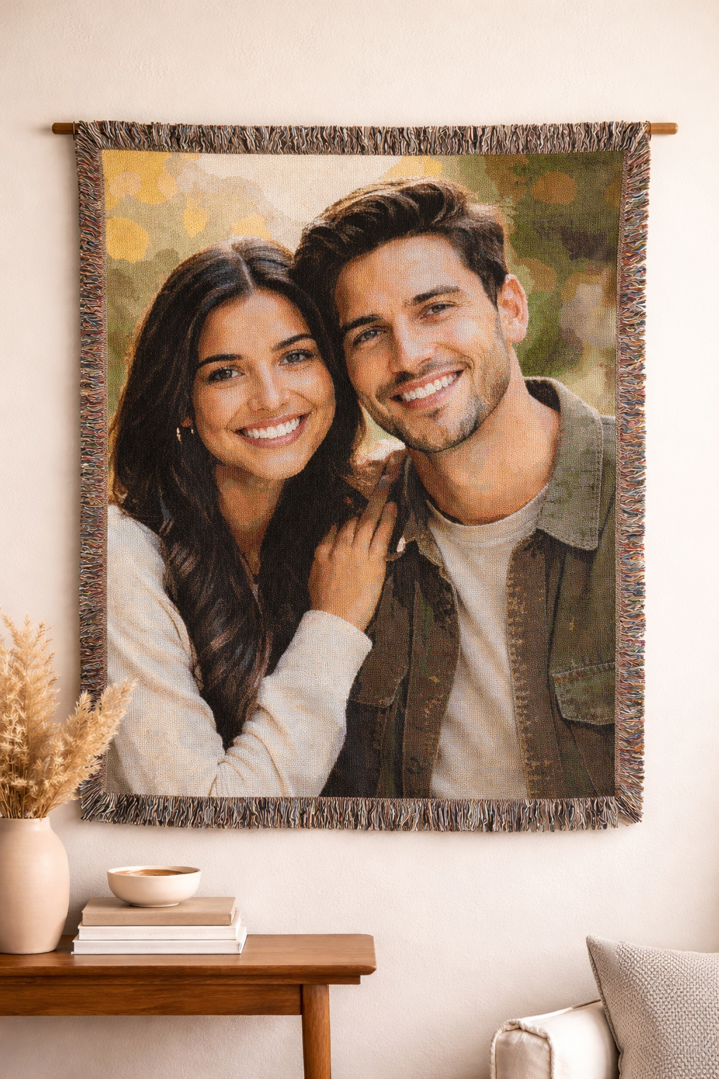 Custom photo woven blanket with a couple photo, hung on a wall above a wooden sideboard