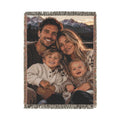 Custom photo woven blanket with a family portrait of a couple and two children woven in, front view