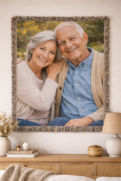 Custom photo woven blanket with a grandparents photo, hung on a wall