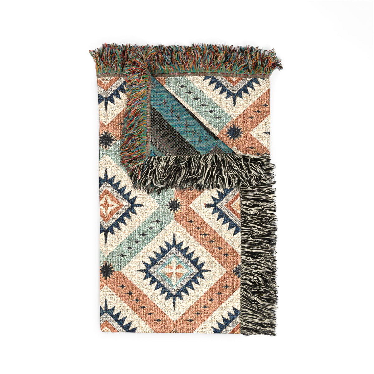 Folded Desert Star woven blanket showing the woven texture and fringe