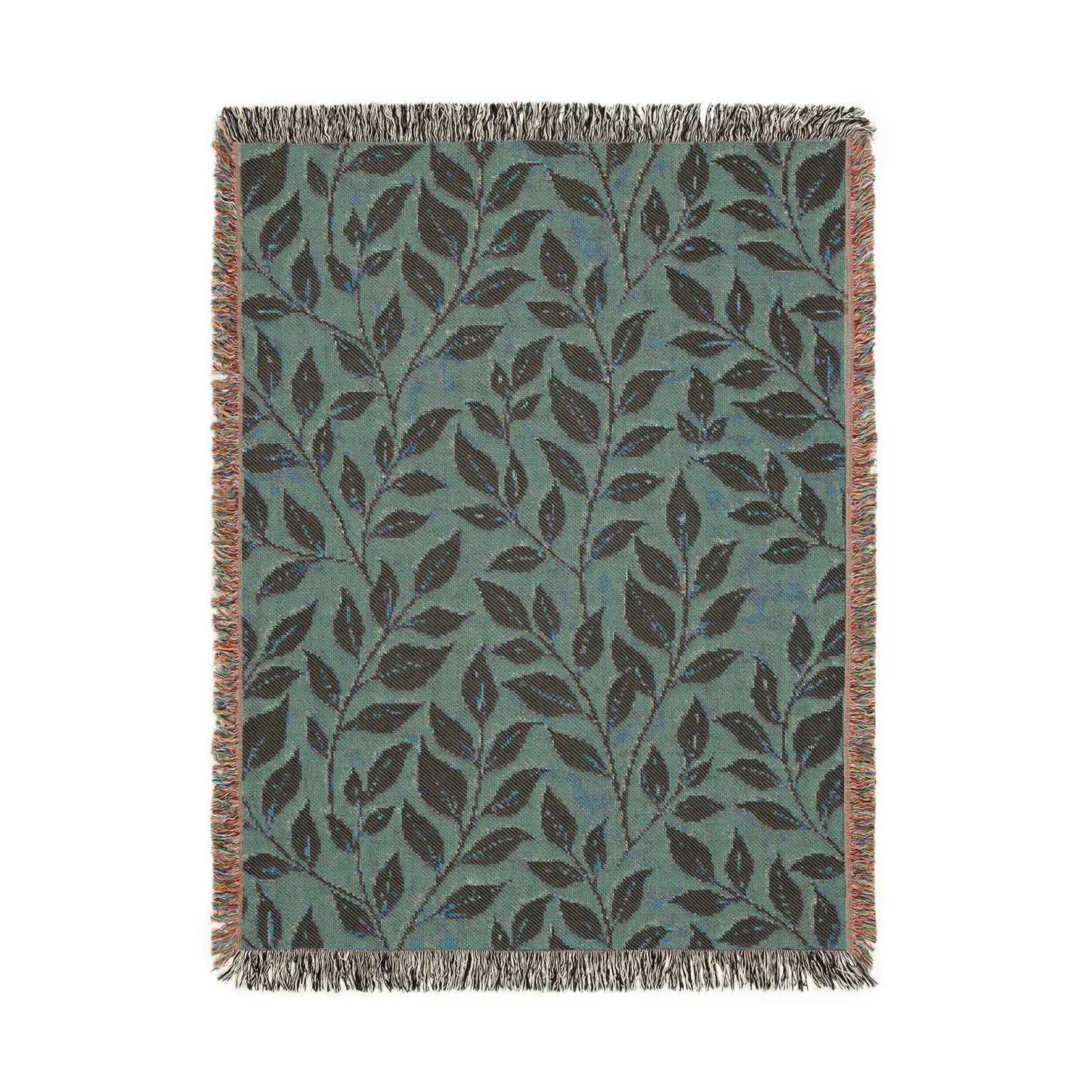 Reverse side of the woven blanket showing the same leaf pattern in sage teal