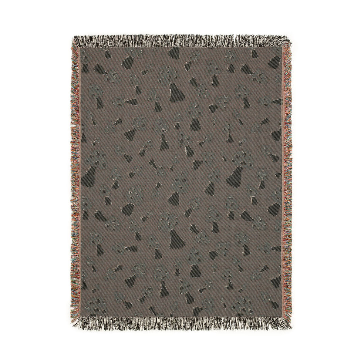 Reverse side of the Mushroom Green woven blanket in muted grey-brown