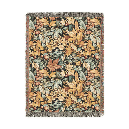 William Morris style fall woven blanket with gold and sage leaves and coral berries on a dark ground