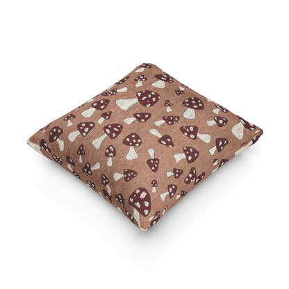 Mushroom Terra woven pillow shown at an angle to show its depth and seam