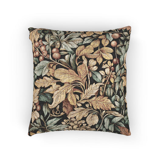 William Morris style fall woven pillow with gold and sage leaves and coral berries on a dark ground, shown at an angle