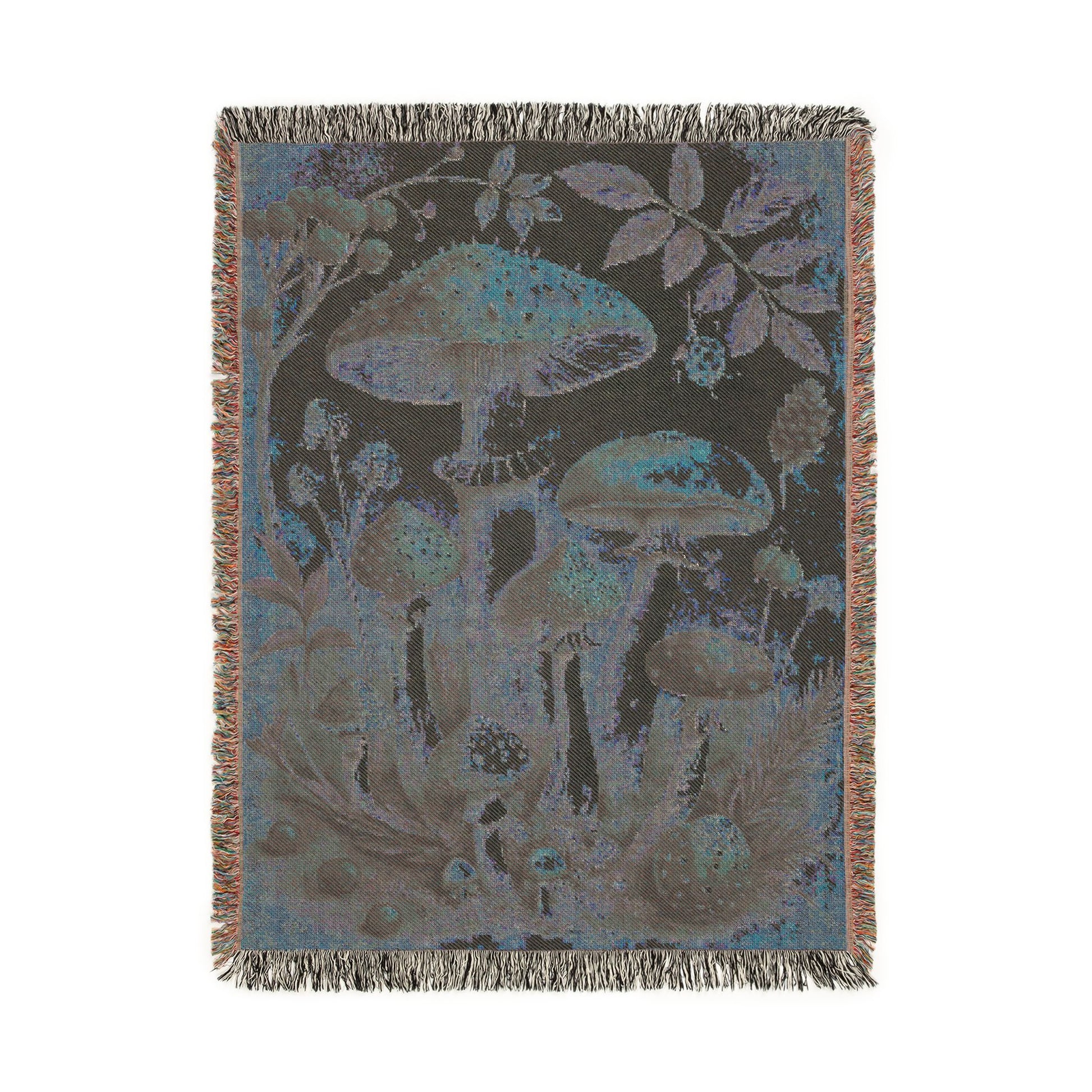 Reverse side of the forest mushroom tapestry blanket in muted blue-grey