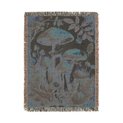 Reverse side of the forest mushroom tapestry blanket in muted blue-grey
