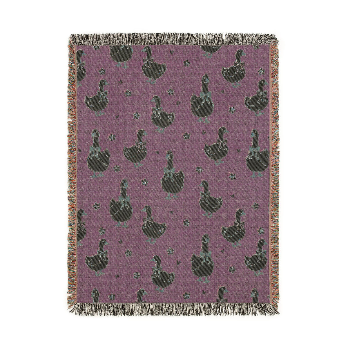 Reverse side of the goose woven blanket in deep plum