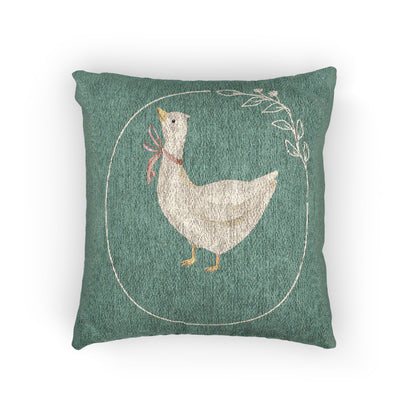 Woven pillow with cream geese in rust, lilac and blue bows and small daisies on sage green, front view
