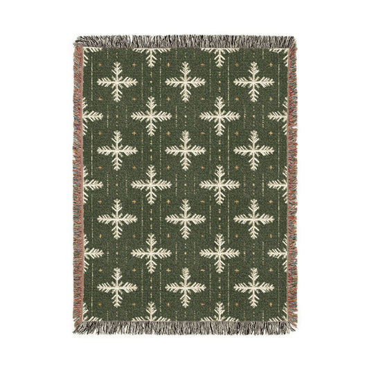 Green Nordic Snowflake woven blanket with cream snowflakes and golden stars on moss green