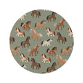 Round nursery rug with chestnut, rust and cream horses on sage green, shown flat