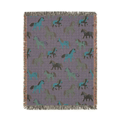 Reverse side of the horse woven blanket in muted mauve