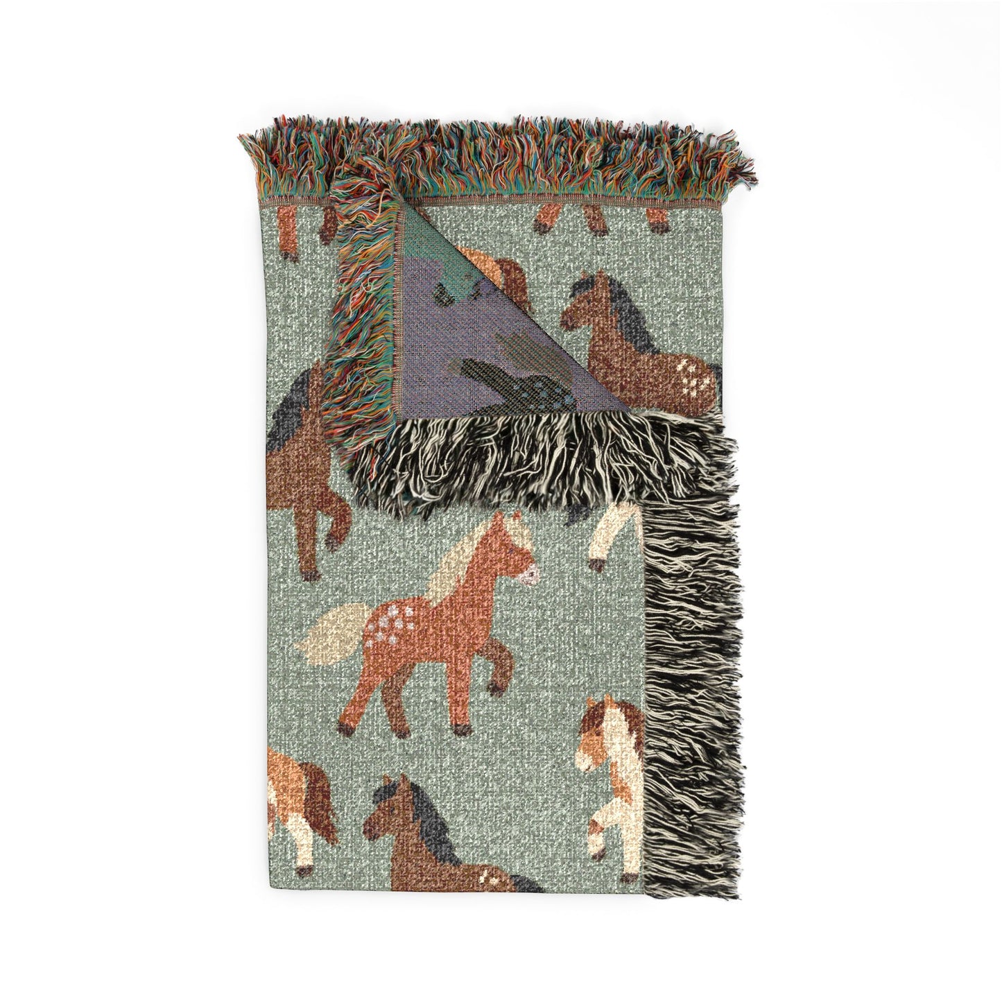 Folded horse woven blanket showing the fringed edge and the mauve reverse side